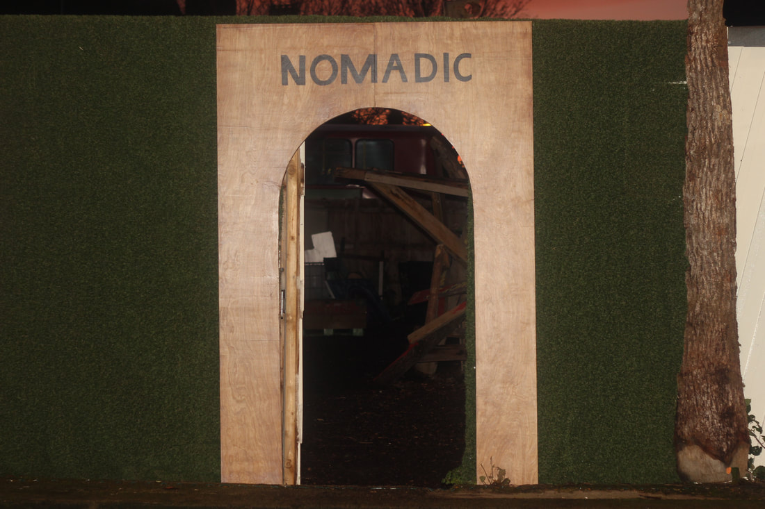 Wooden archway with the word 