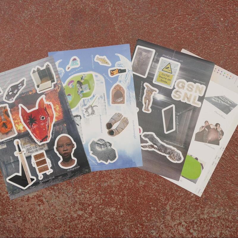 Four sticker sheets spread overlapping one another on a maroon floor. On each sheet are different shaped tiny stickers of different art works.